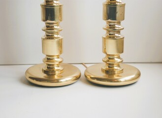 Fototapeta na wymiar brass lamp bases in Hollywood Regency style.