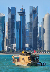 great panoramic views of the capital of Qatar with ships and skyscrapers 