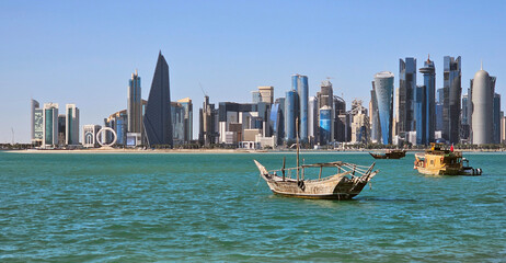 great panoramic views of the capital of Qatar with ships and skyscrapers 