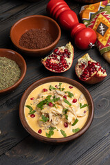 Creamy chicken curry with pomegranate and parsley
