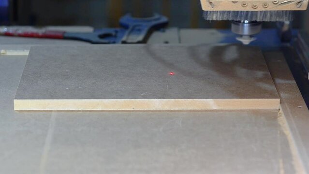 Milling of MDF board with computer-controlled milling machine