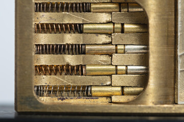 Macro dissected view of the inside of a padlock