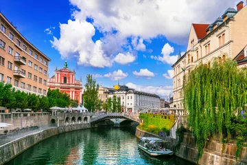 Poster Travel and landmarks of Slovenia - beautiful Ljubljana capital city, scenic canals in downtown. © Freesurf
