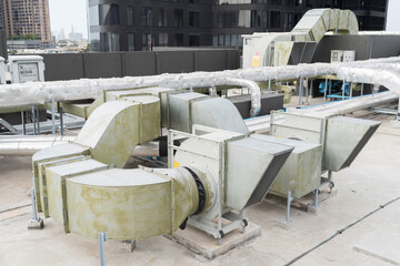Pipes cooling AHU for ventilation, Air conditioning. Pipes of HVAC air conditioning network system on building rooftop