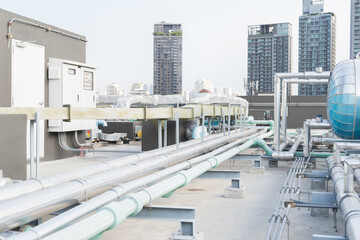 Pipes cooling AHU for ventilation. Pipes of HVAC air conditioning network system on building...
