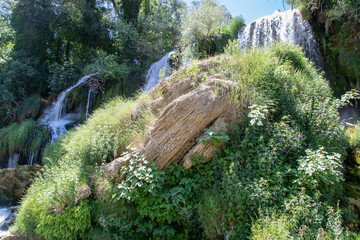 Vodopad Kravica, Kravice waterfall, a large tufa cascade on the Trebižat River, in the karstic...