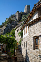 Fototapeta na wymiar Medieval fortified town Pocitelj in Capljina municipality near Mostar in Herzegovina region, Bosnia and Herzegovina. Šišman Ibrahim Pasha Mosque, Džebhana, Clocktower (Sahat-kula)