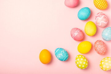 Easter eggs on a bright background. Easter celebration concept. Colorful easter handmade decorated Easter eggs. Place for text. Copy space.