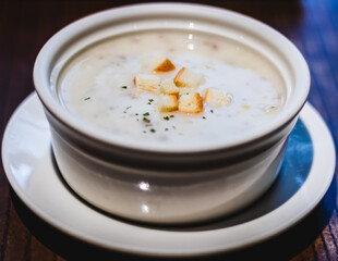 Thick mushroom soup spread with some croutons and Italian spices
