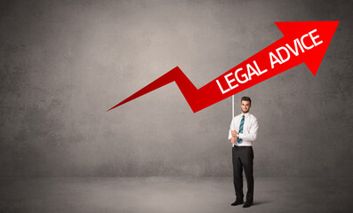 Obraz premium Young business person in casual holding road sign