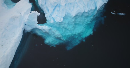 Antarctic iceberg underwater melting ice, global warming, ecology, climate change concept. Close up...