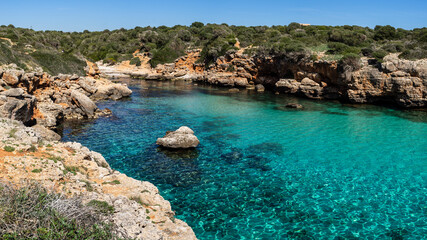 turquoise waters in Cala Petita, Porto Cristo, coast of Manacor, Majorca, Balearic Islands, Spain