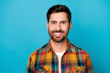 Photo of optimistic cheerful positive man with beard dressed plaid shirt toothy smiling at camera...