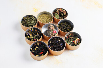 Different types of tea in a pepper boxes.