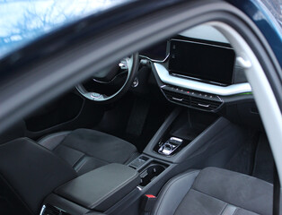 View From Opened Rear Door On A Front Seats Trimmed With Alcantara And Black Leather In Premium Class Car Interior 