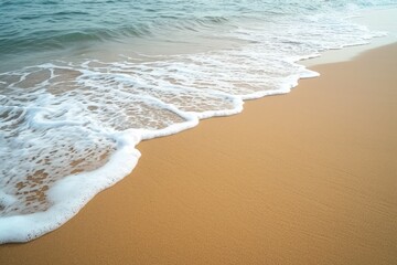 Gentle waves lapping at a sandy shoreline