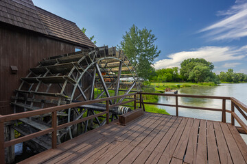 Fototapeta na wymiar Water wheel mill and open-air museum in Jelka, Slovakia