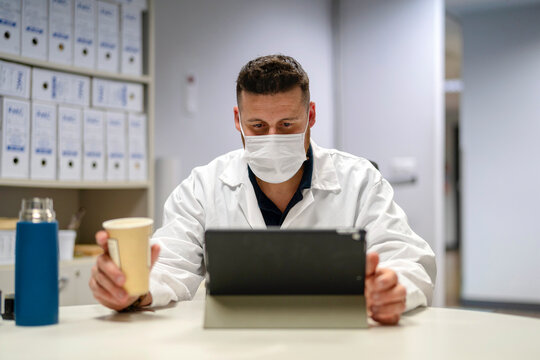 Doctor reviewing medical files