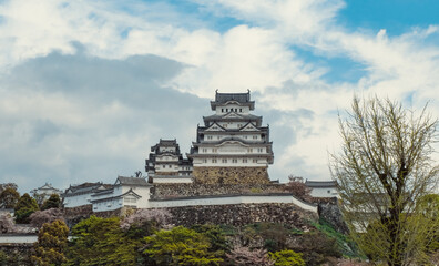 Fototapeta na wymiar Clouds and Sky Behind an Old Japan Shrine 
