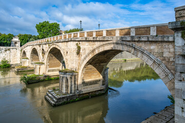 Fototapeta na wymiar A Bridge over the Tiber in Rome, Italy