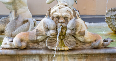 A face as a Fountain spout in Rome