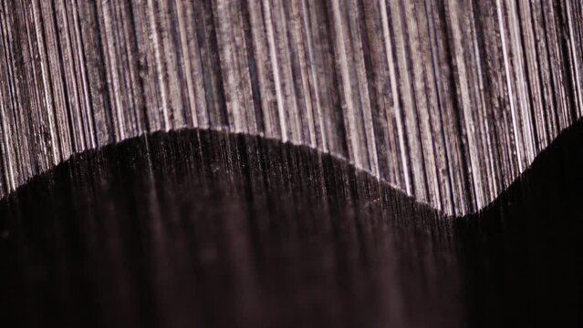 High-tech steel alloy under microscope. Raw material for production of medical instruments and equipment for space industry. Titanium, tungsten alloys. Super macro metal texture
