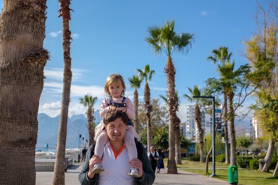 Father and daughter walking 