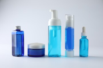 Set of luxury cosmetic products on white background