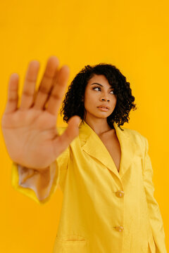 Black woman showing no gesture in studio