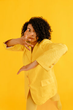 Young woman performing kung fu pose