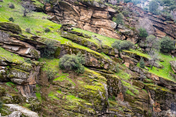 Tasyaran canyon, which attracts attention with its rock shapes similar to Antelope canyon in Arizona, offers a magnificent view to its visitors. Canyon view and stream at sunset. Usak, Turkey.