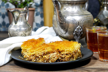 Traditional homemade arabic sweets (dessert kadaif, kunafa, baklava), ramadan kareem concept