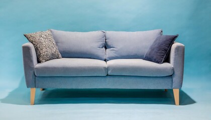 soft blue sofa on blue background