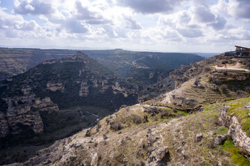 Ulubey Canyon is a nature park in the Ulubey and Karahallı of Usak, Turkey. The park provides suitable habitat for many species of animals and plants and is being developed as a centre for ecotourism.