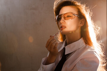 Badass fashionable woman with lipstick 