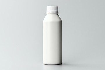 A white plastic bottle with a matching cap, set against a gray backdrop