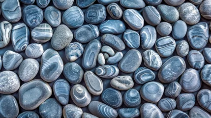 Fotobehang Smooth striped pebbles texture background © edojob