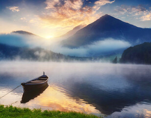 Misty morning lake with a row boat.