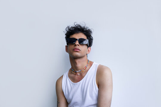 Young Hispanic man in trendy sunglasses 