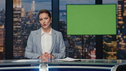 Anchorwoman broadcasting greenscreen display studio. Presenter ending broadcast