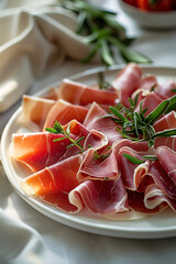 Ham on a white plate, in the style of light red and dark beige, detailed miniatures