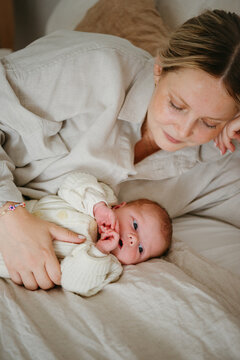 Secure and tender moment between mother and newborn