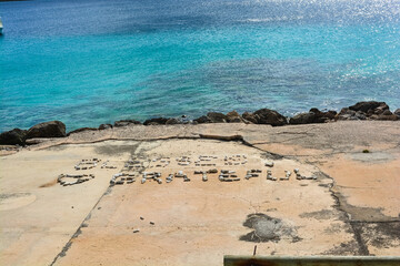 Blessed and grateful - words made of little pebbles.