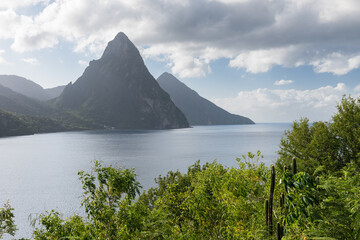 View from near Rachette Point of the St. Lucia Pitons.
Looking south across lush green foliage of...
