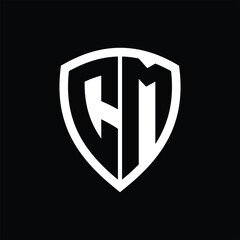 CM monogram logo with bold letters shield shape with black and white color design