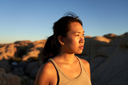 south east asian girl explores outdoors