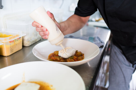 Chef seasoning delicious healthy fish dish