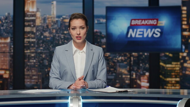 Newscaster ending late night news on tv. Female anchor leaving evening studio