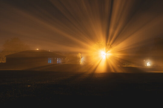 Light rays from a street light at night