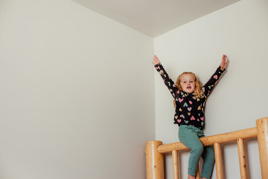 Cheering while climbing with the corner near.